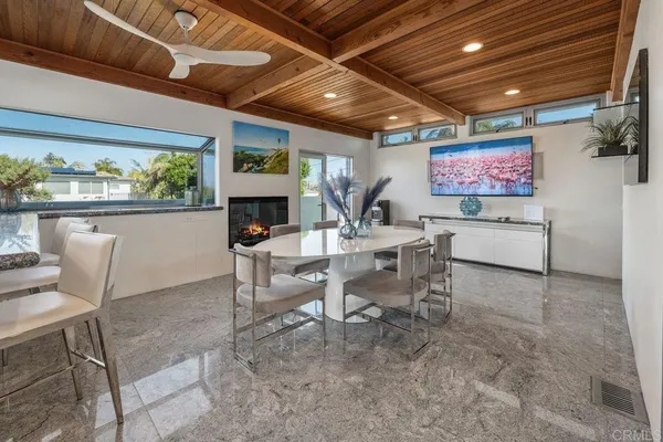 a kitchen that has a sink and a stove