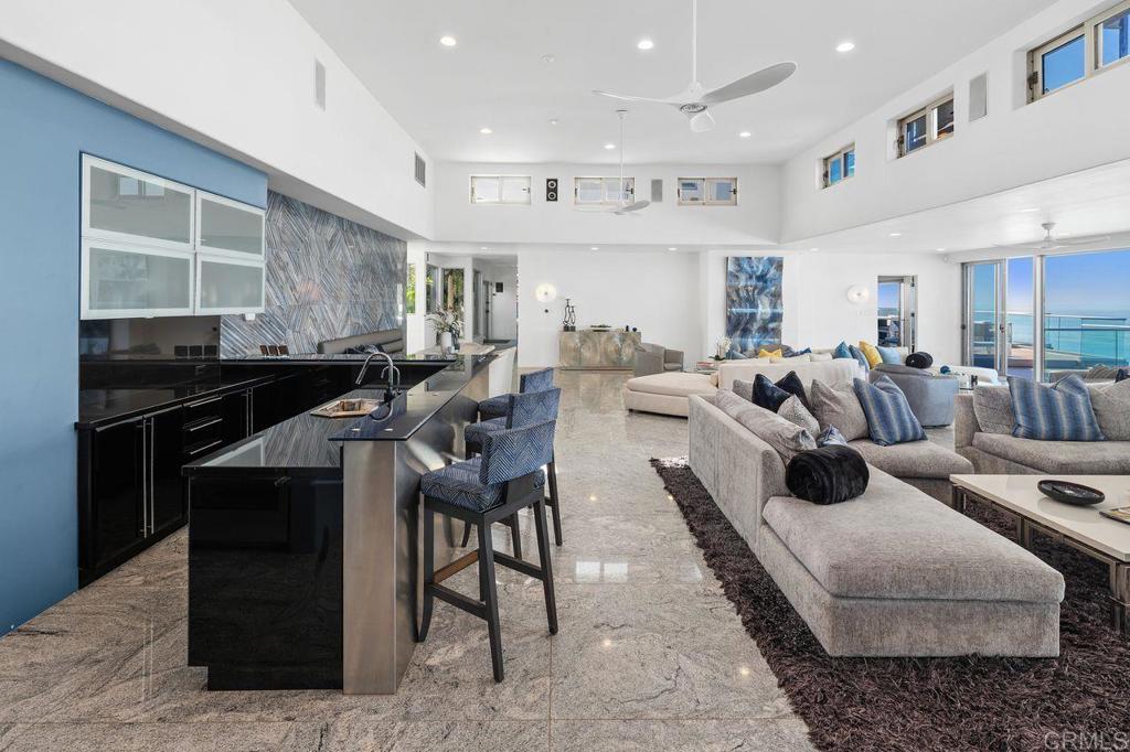 806 4th Street Encinitas, CA 92024 - Photo 7 of 47 a living room with furniture and a large window