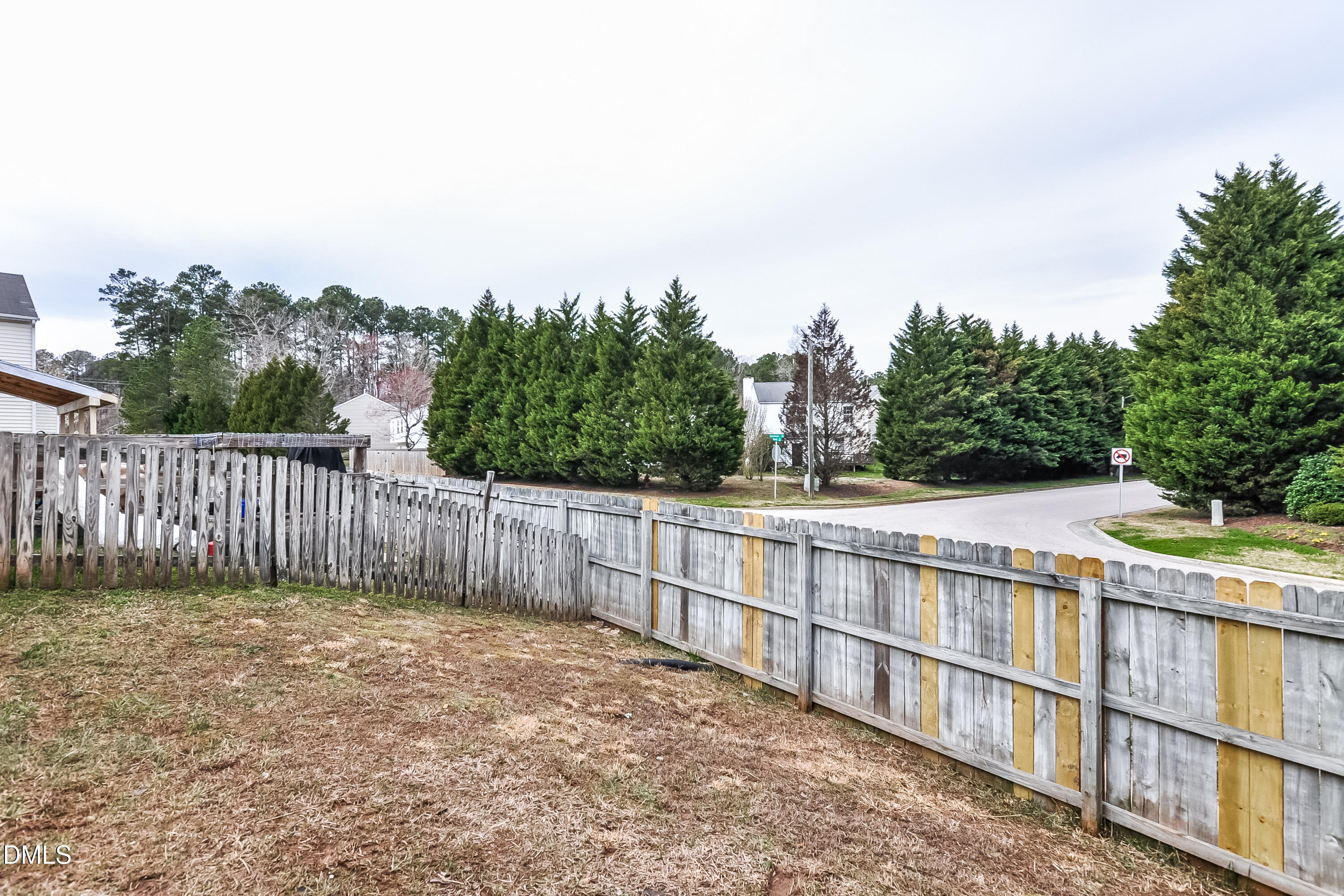3619 Sana Court Durham, NC 27713 - Photo 15 of 15 a view of a fence and trees in the background