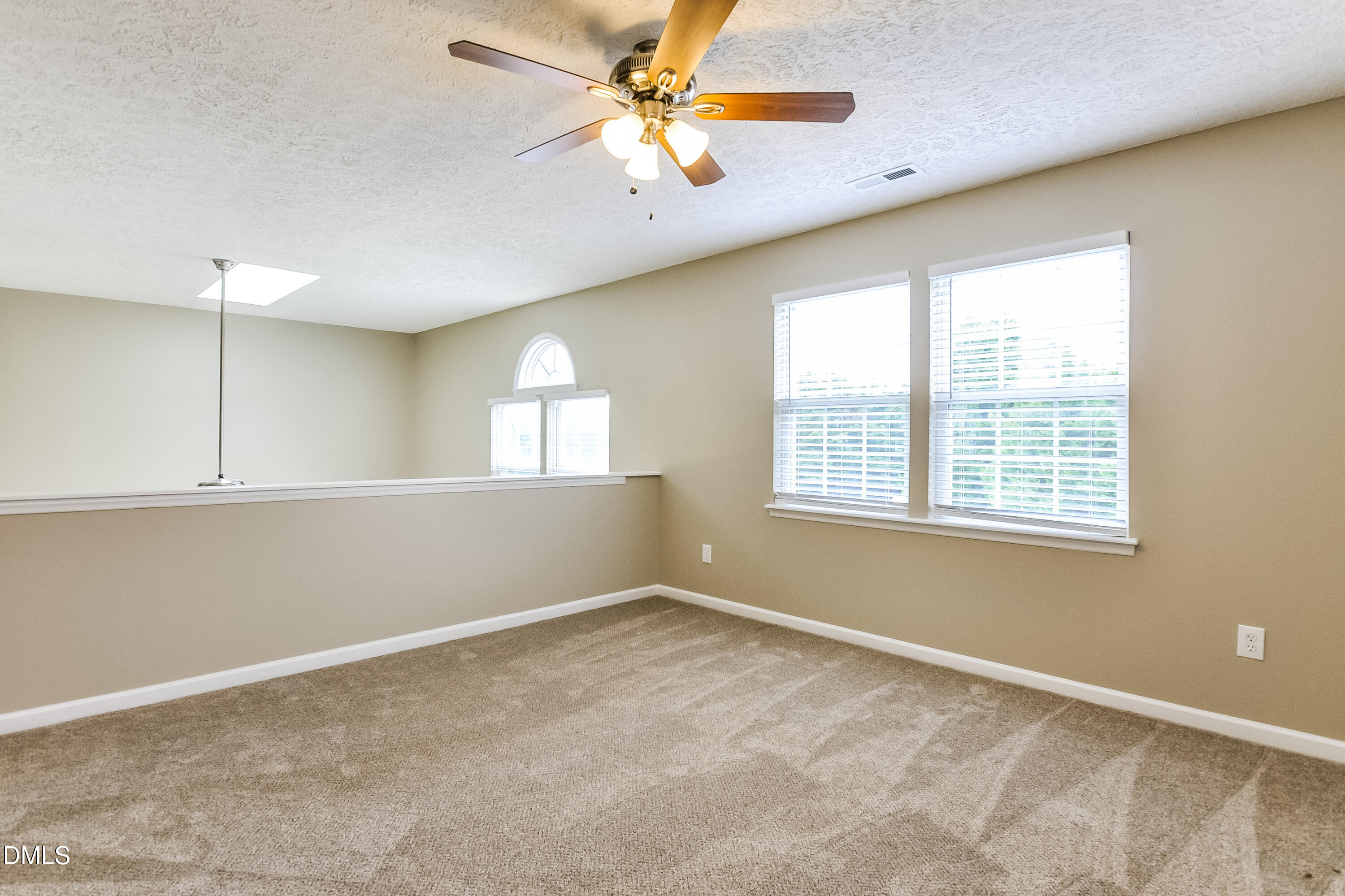 3619 Sana Court Durham, NC 27713 - Photo 4 of 15 a view of an empty room with a window
