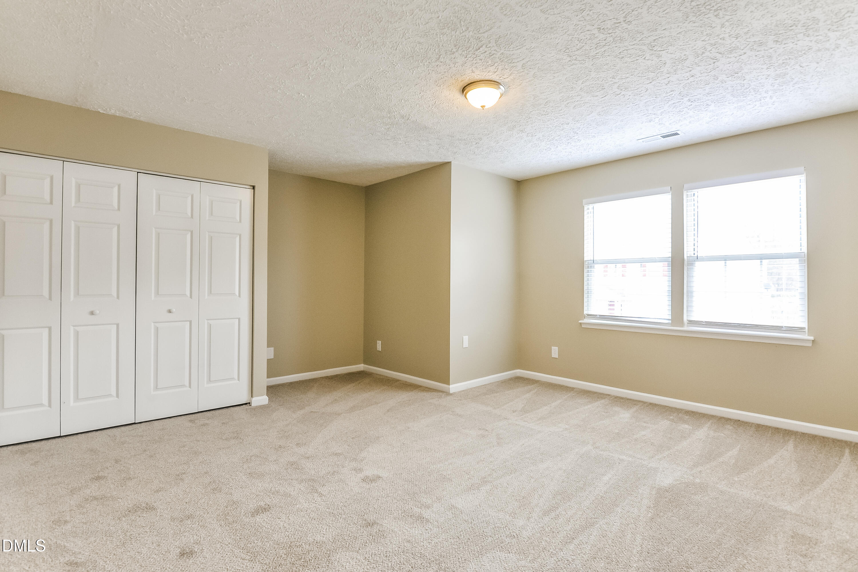 3619 Sana Court Durham, NC 27713 - Photo 5 of 15 an empty room with windows