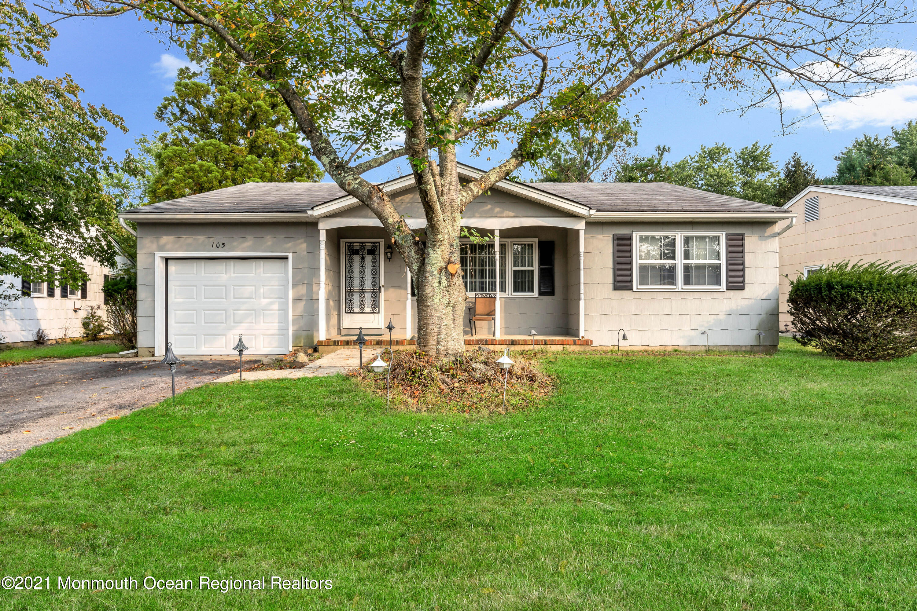 105 Georgetown Road Toms River, NJ 08757 - Photo 2 of 35 a front view of house with yard and green space