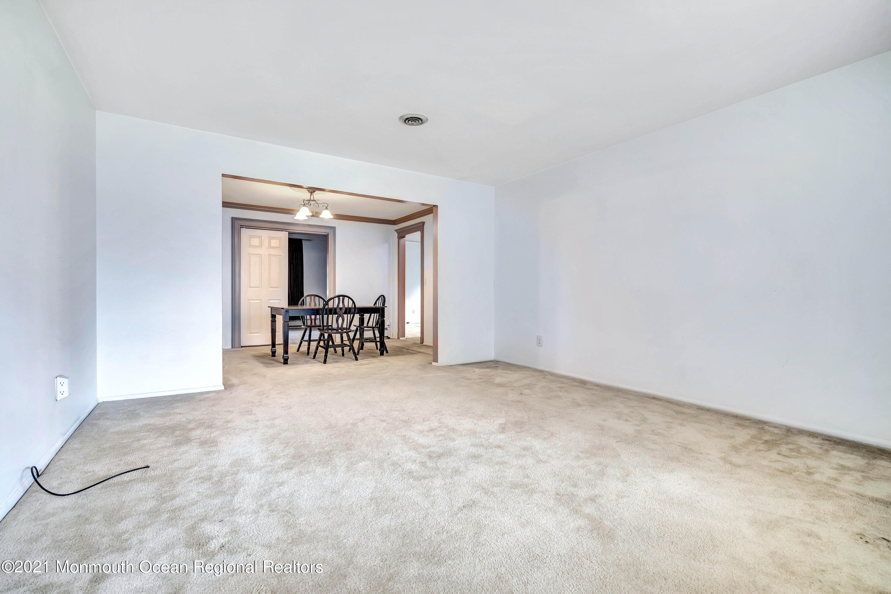 105 Georgetown Road Toms River, NJ 08757 - Photo 11 of 35 a view of a room with furniture and chandelier