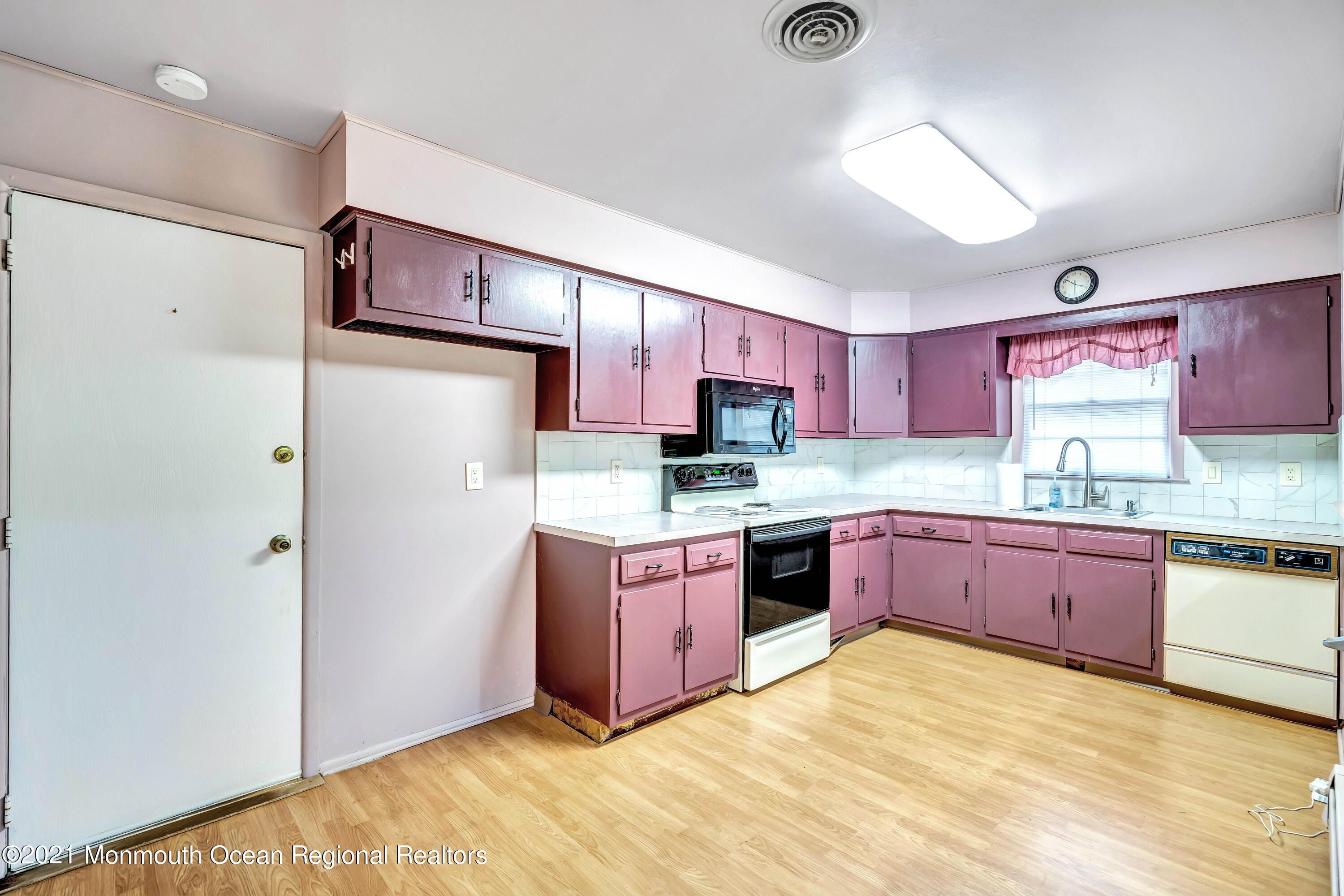 105 Georgetown Road Toms River, NJ 08757 - Photo 17 of 35 a kitchen with granite countertop a refrigerator and a sink