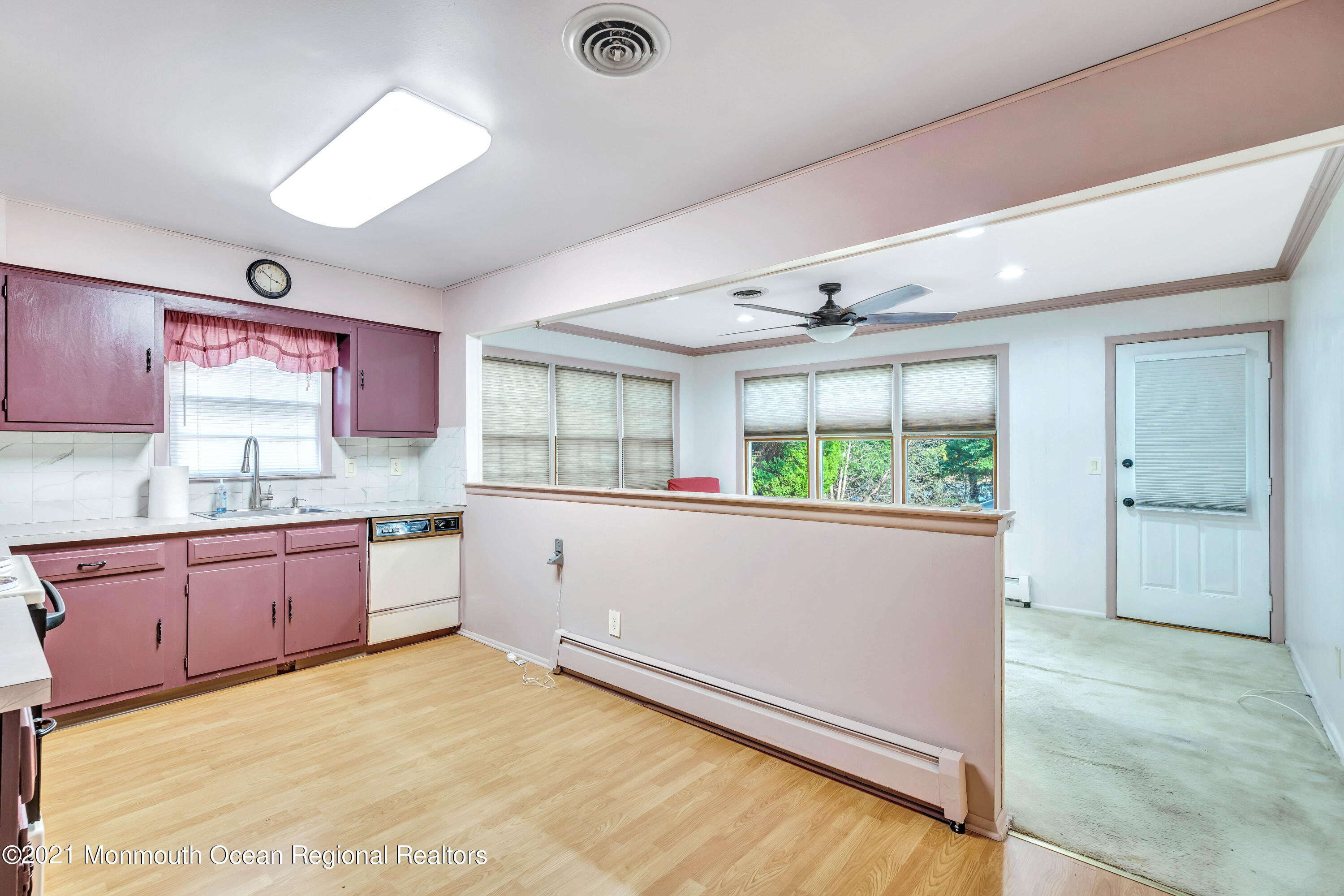 105 Georgetown Road Toms River, NJ 08757 - Photo 18 of 35 a large kitchen with granite countertop a large window and white appliances