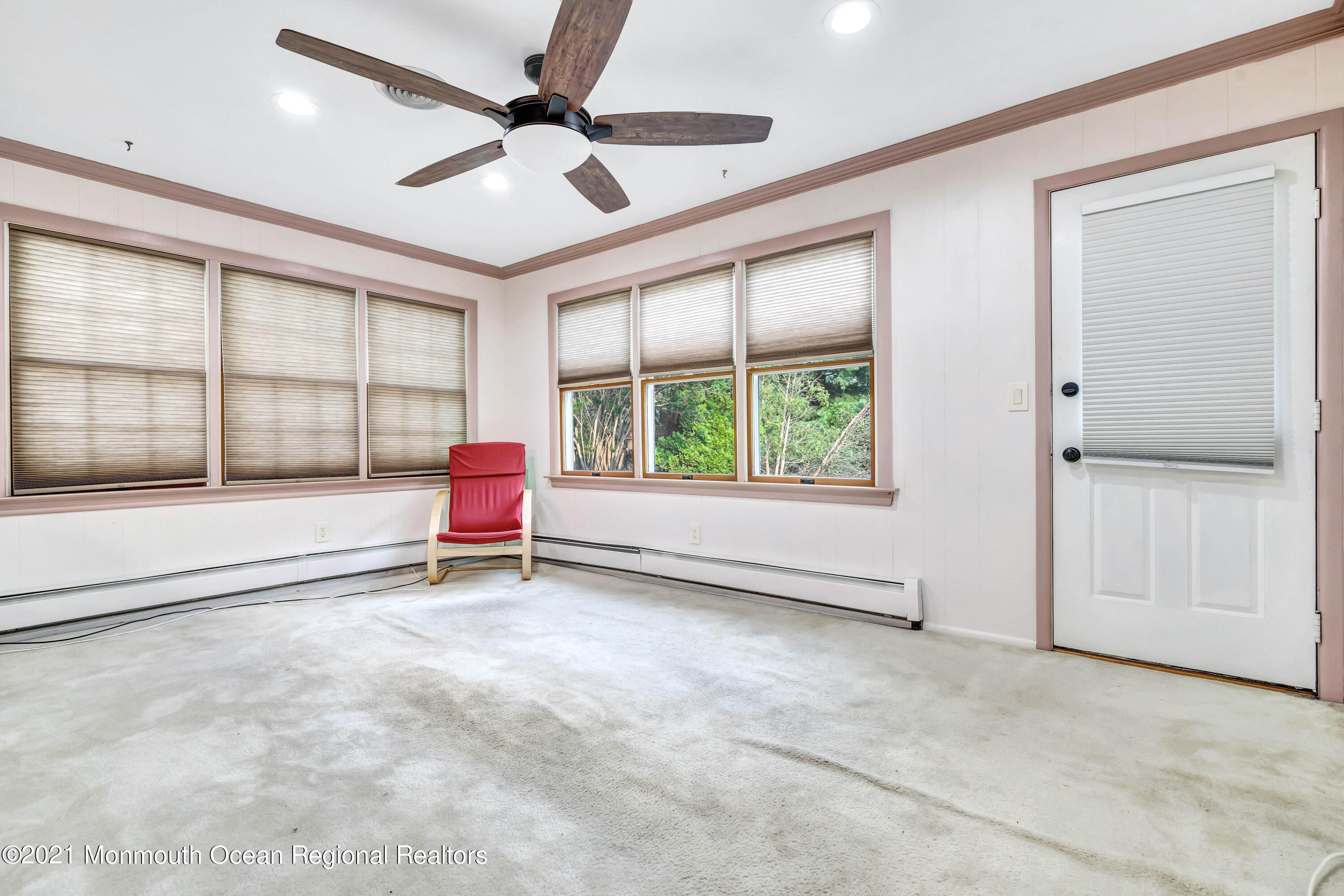 105 Georgetown Road Toms River, NJ 08757 - Photo 23 of 35 an empty room with ceiling fan and windows