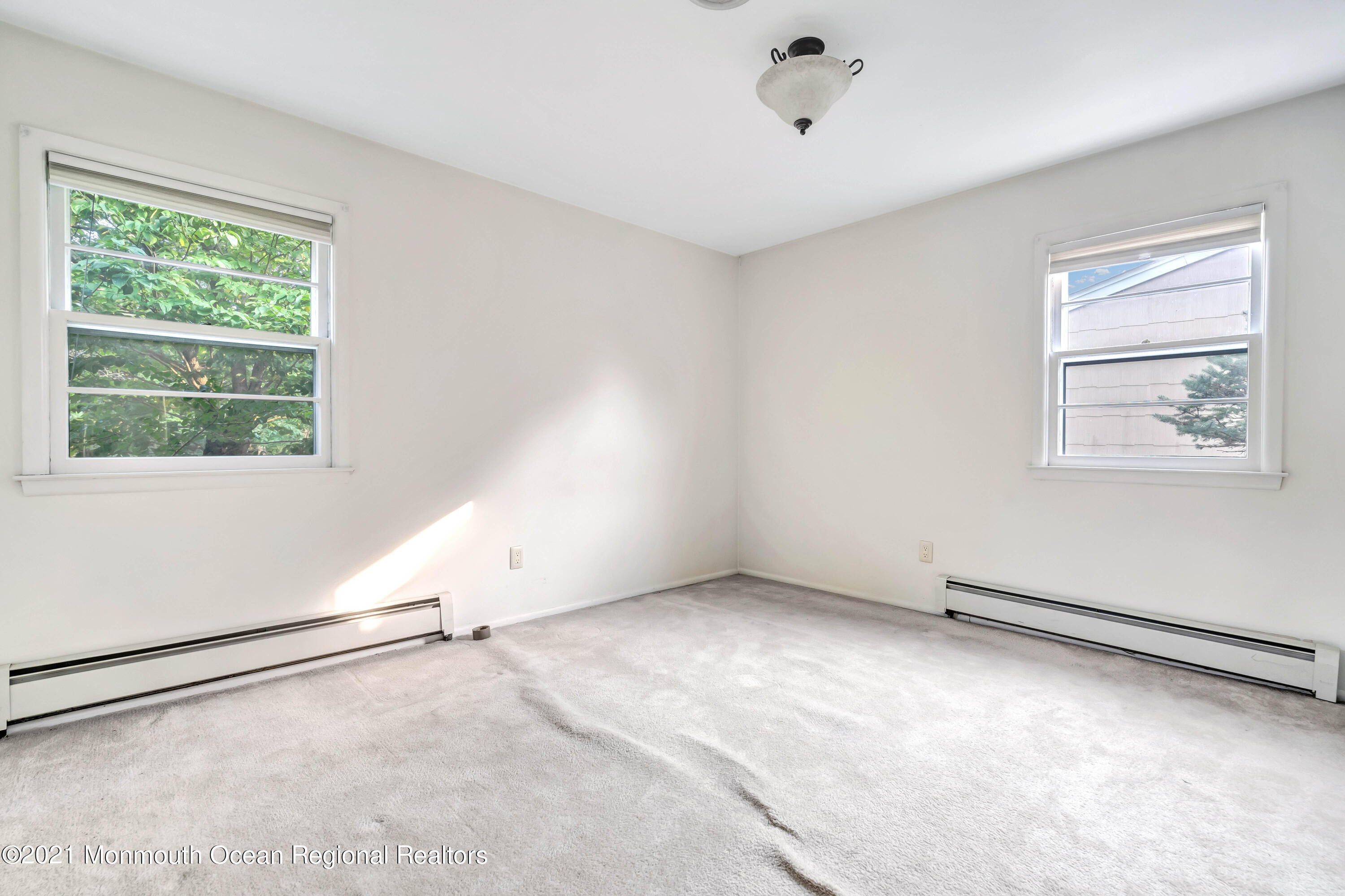 105 Georgetown Road Toms River, NJ 08757 - Photo 26 of 35 an empty room with windows