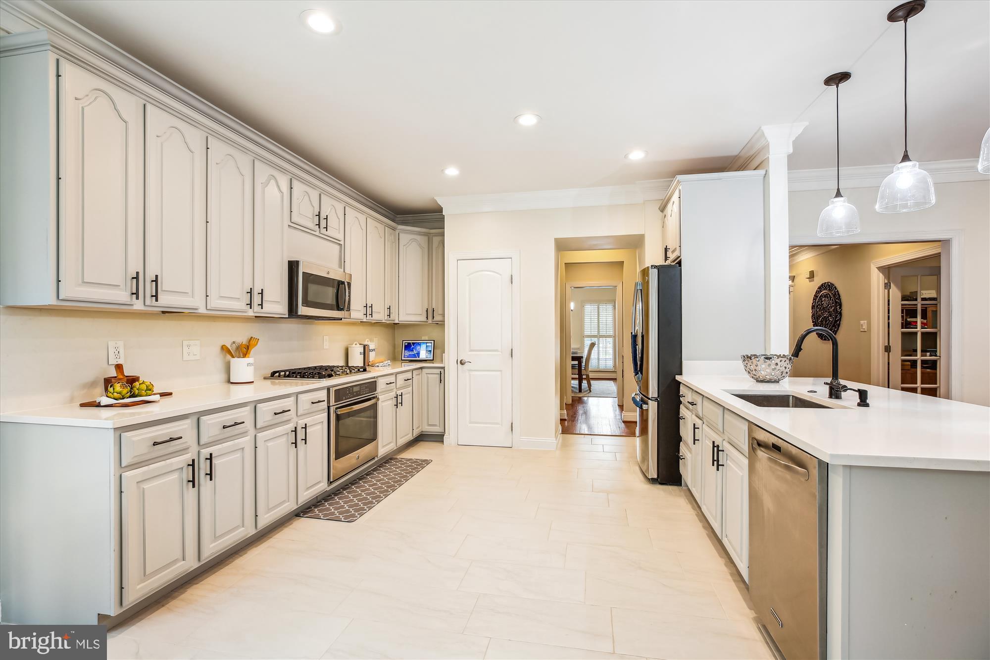 302 Tschiffely Square Road Gaithersburg, MD 20878 - Photo 13 of 77 a large kitchen with stainless steel appliances lots of counter space sink and cabinets