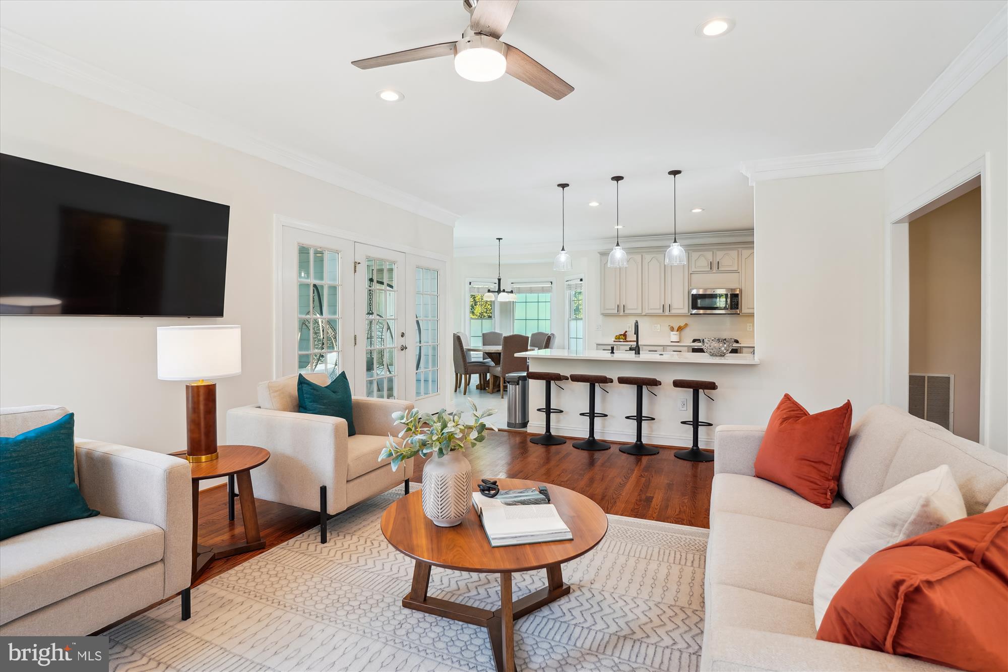 302 Tschiffely Square Road Gaithersburg, MD 20878 - Photo 22 of 77 a living room with furniture and a flat screen tv