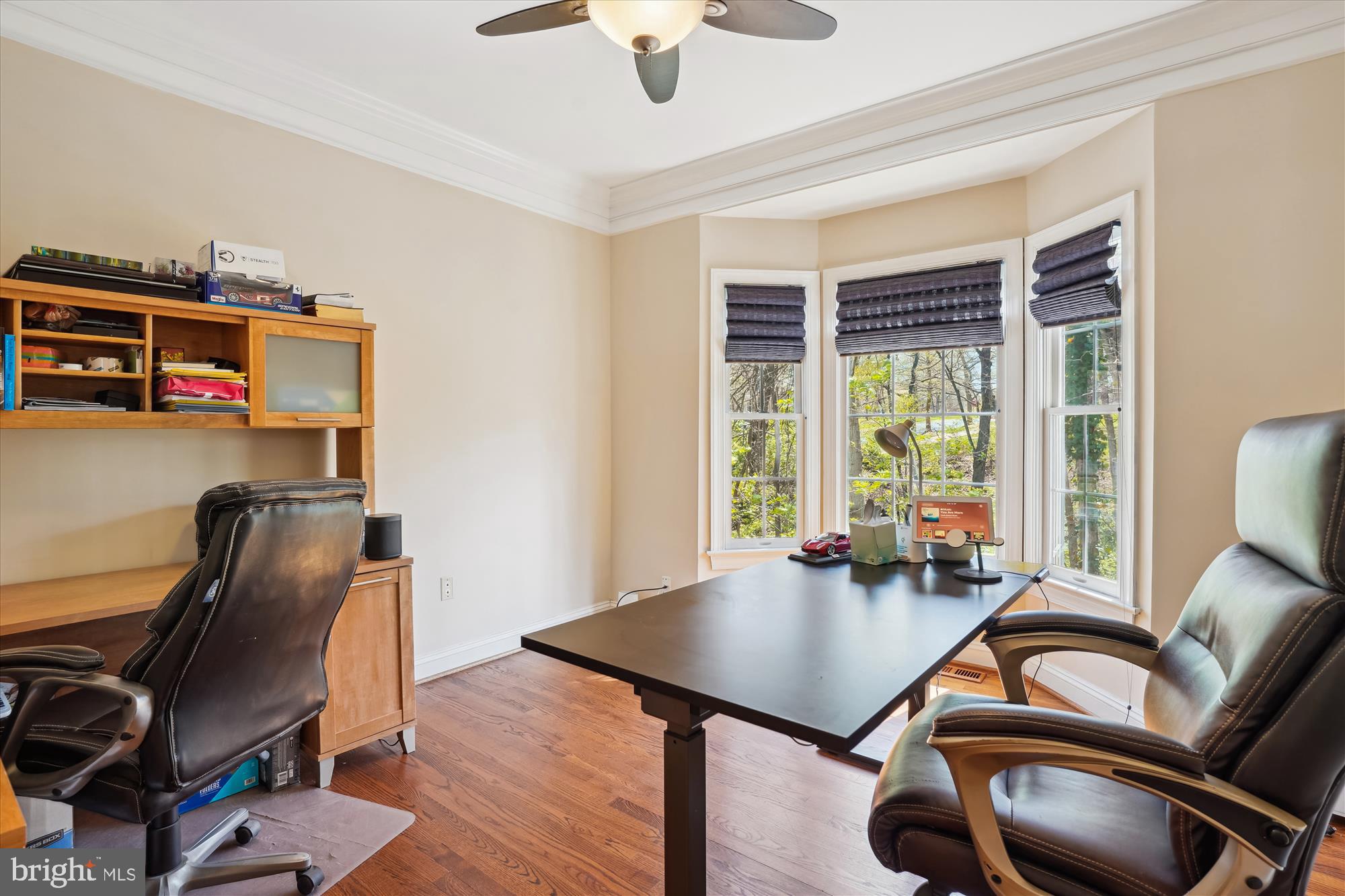 302 Tschiffely Square Road Gaithersburg, MD 20878 - Photo 24 of 77 a view of a workspace with furniture and a window