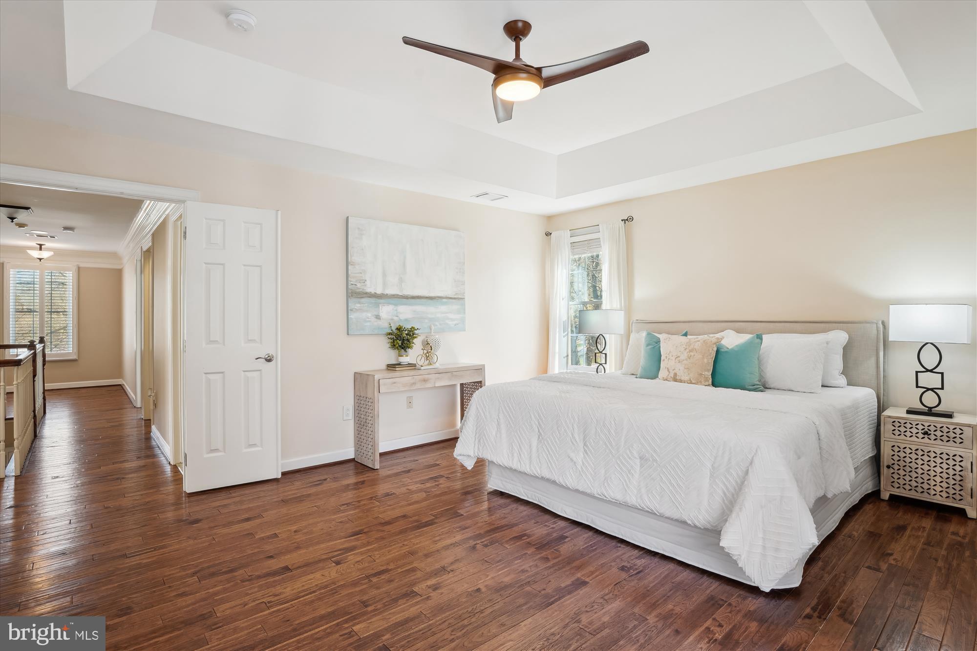 302 Tschiffely Square Road Gaithersburg, MD 20878 - Photo 31 of 77 a bedroom with a bed and a chandelier