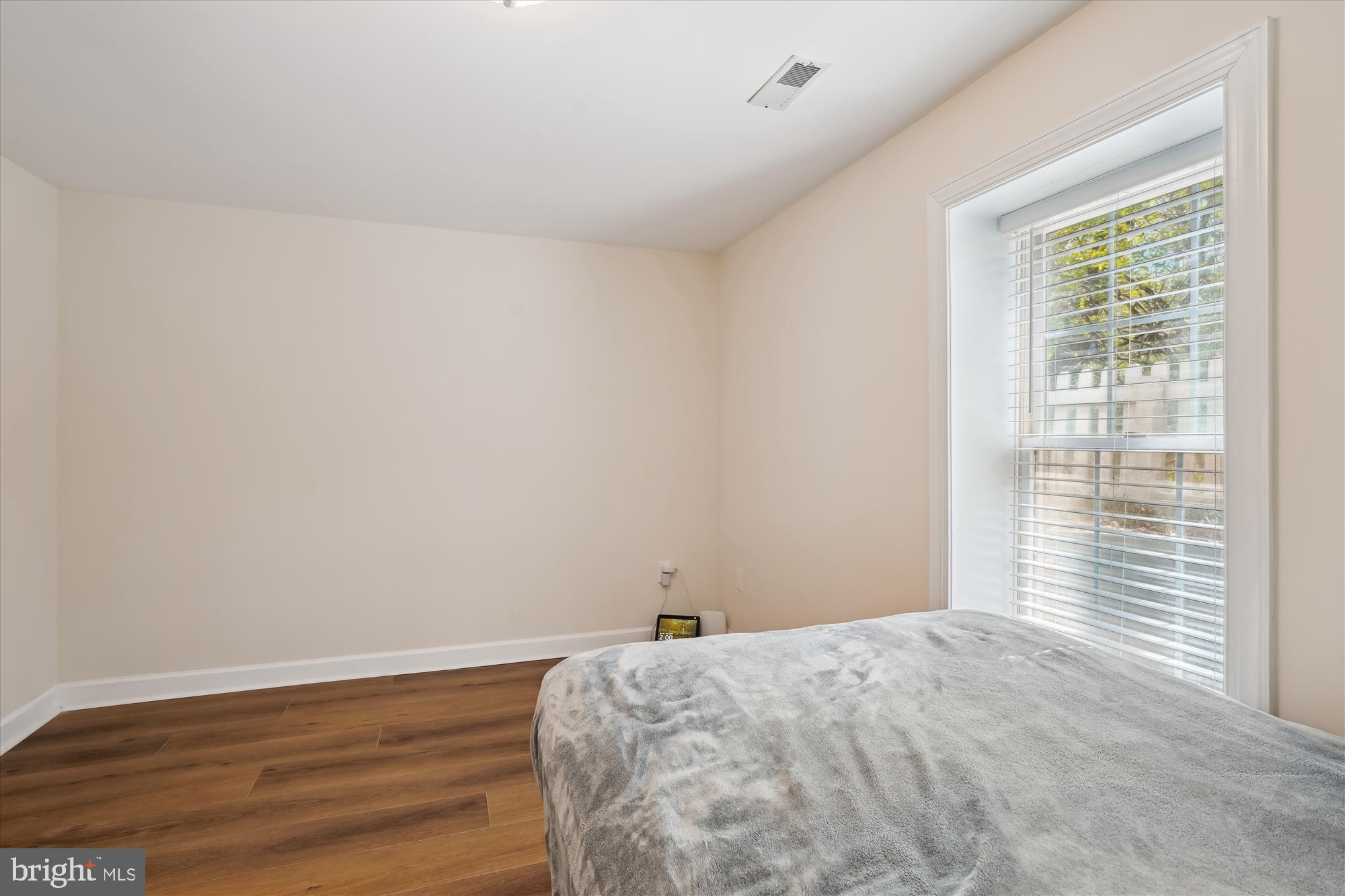 302 Tschiffely Square Road Gaithersburg, MD 20878 - Photo 54 of 77 a bedroom with a bed and a window