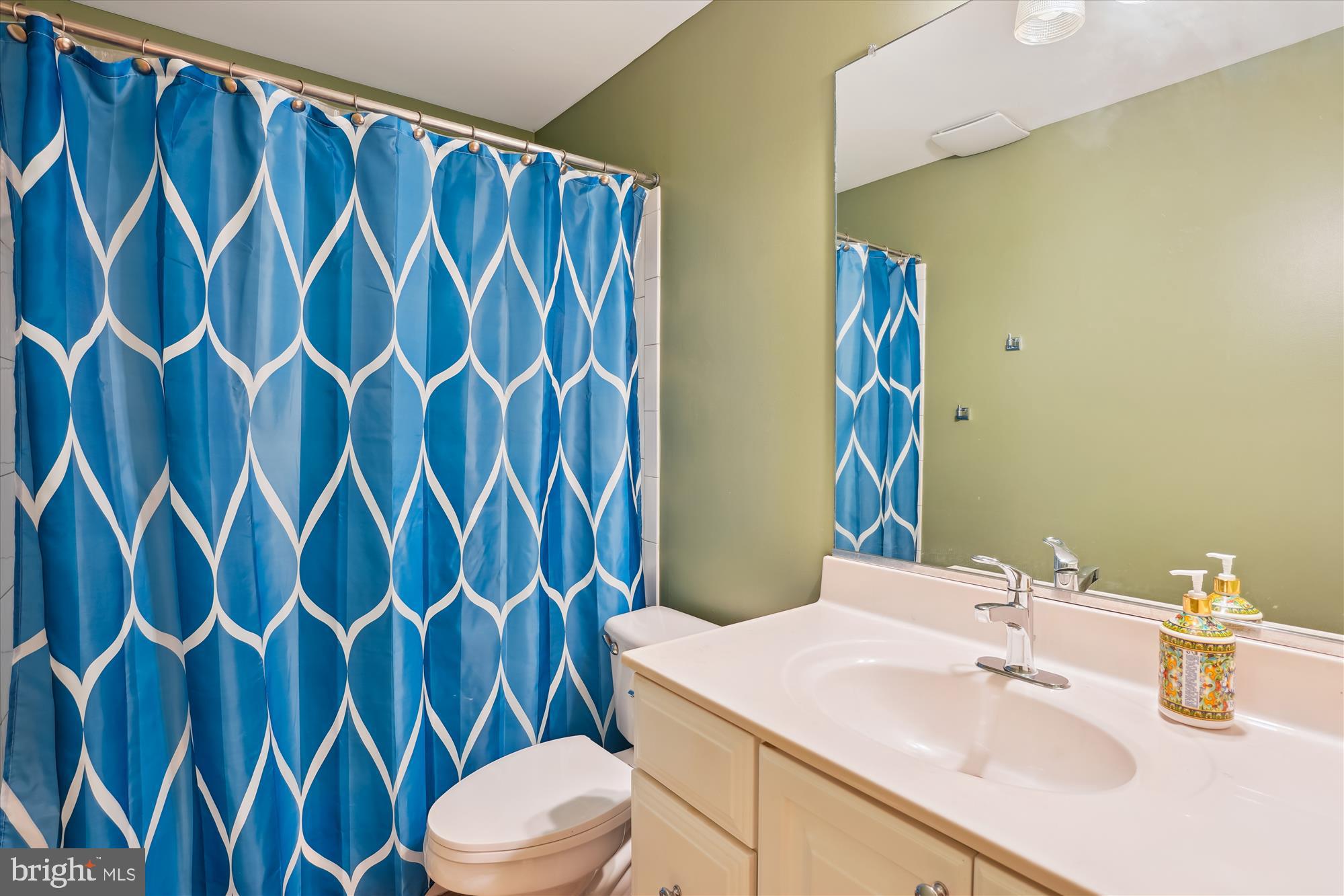 302 Tschiffely Square Road Gaithersburg, MD 20878 - Photo 55 of 77 a bathroom with a sink toilet and shower