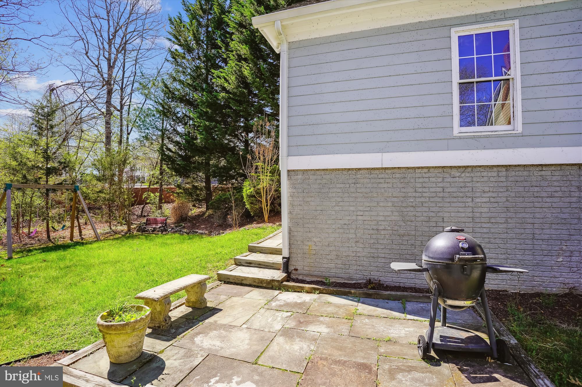 302 Tschiffely Square Road Gaithersburg, MD 20878 - Photo 57 of 77 a view of a chair and table in backyard of the house