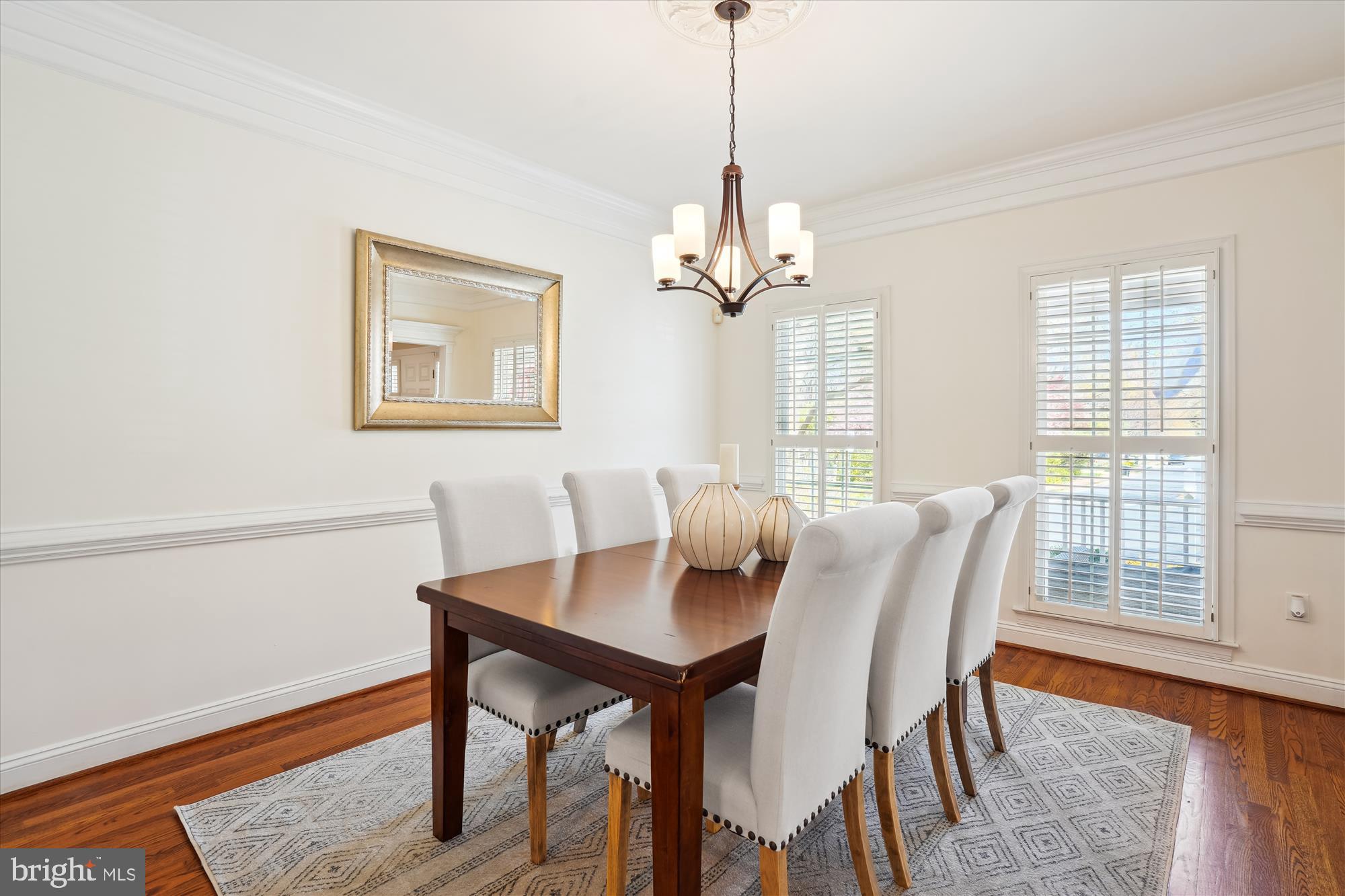 302 Tschiffely Square Road Gaithersburg, MD 20878 - Photo 9 of 77 a view of a dining room with furniture window and wooden floor
