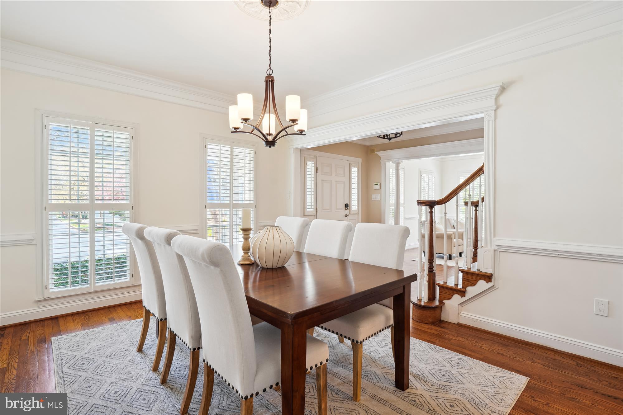302 Tschiffely Square Road Gaithersburg, MD 20878 - Photo 10 of 77 a view of a dining room with furniture window and wooden floor