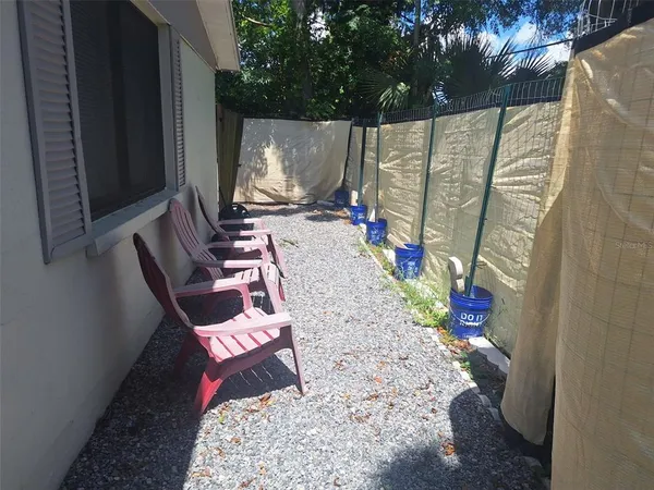 a outdoor dining space with furniture