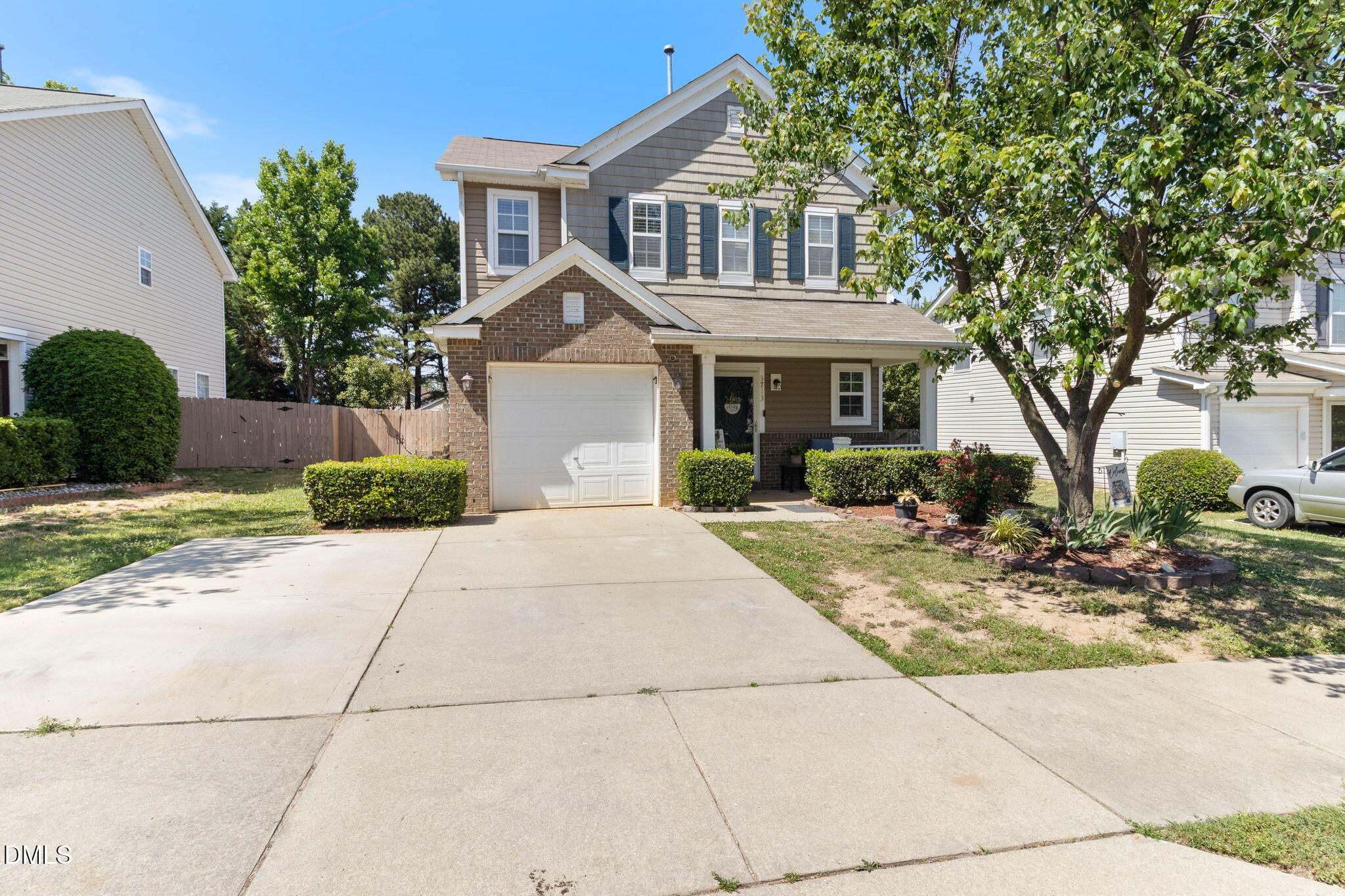 3713 Marshlane Way Raleigh, NC 27610 - Photo 2 of 38 a front view of a house with garden