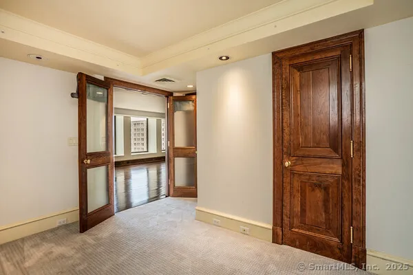 a view of empty room with front door