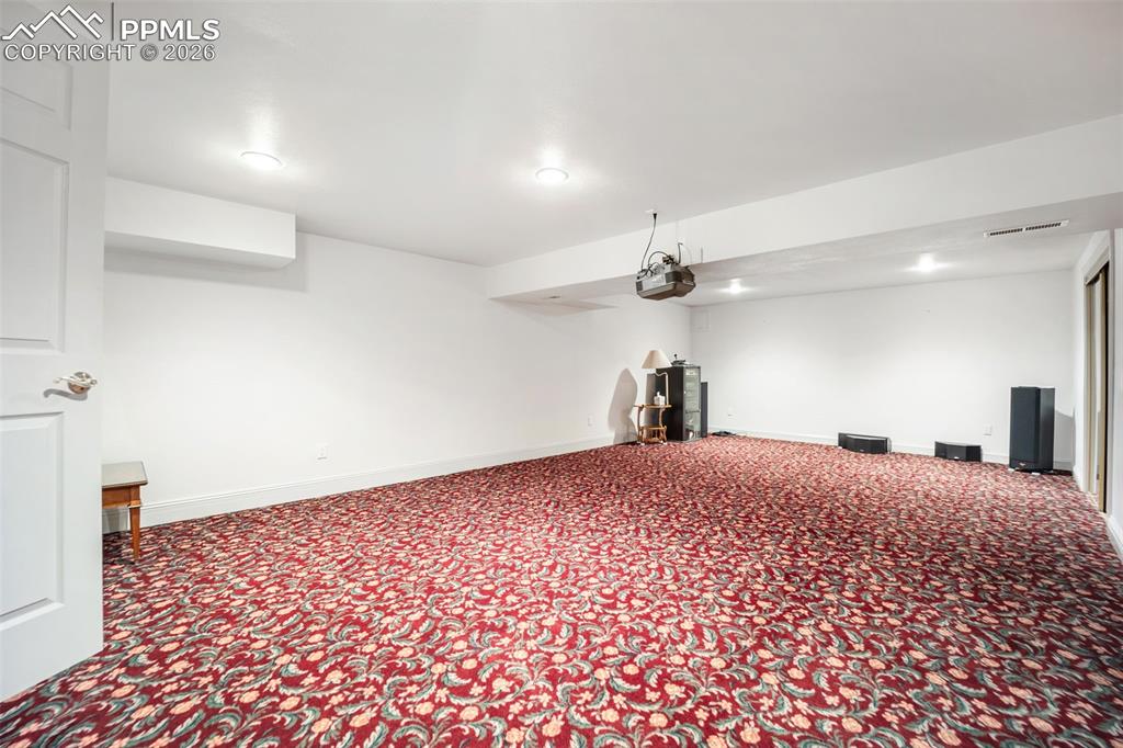 15 Mirada Road Colorado Springs, CO 80906 - Photo 34 of 50 Movie Theater Room with two large closets