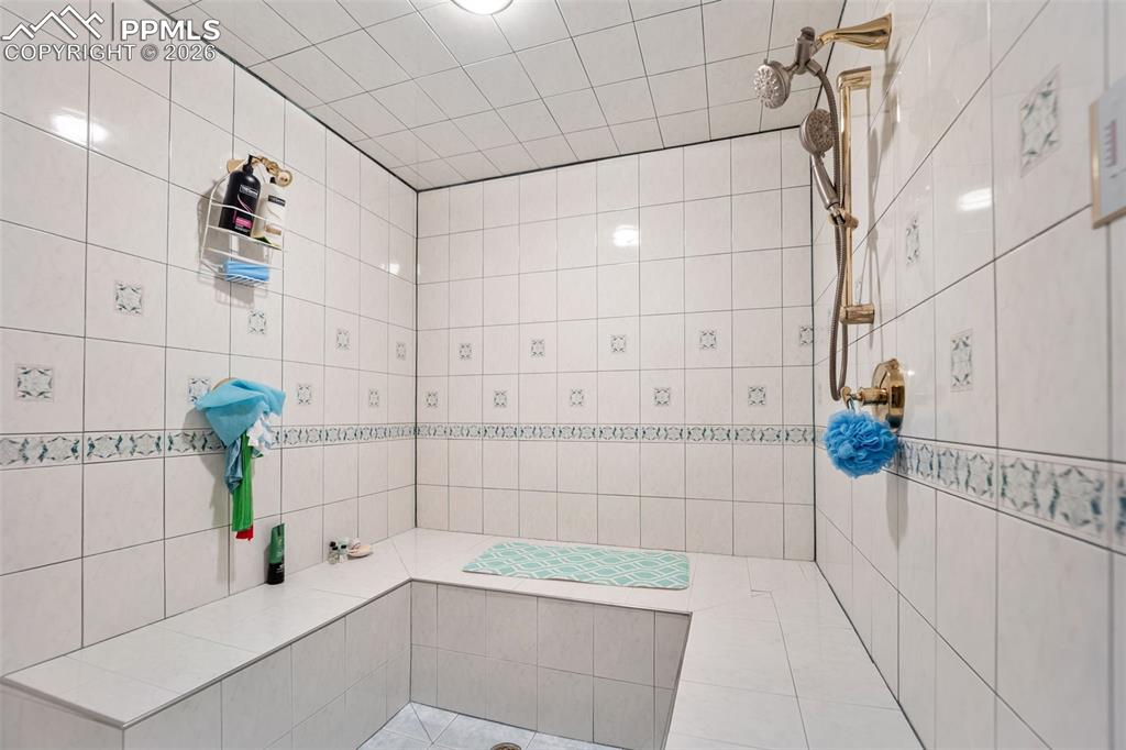 15 Mirada Road Colorado Springs, CO 80906 - Photo 37 of 50 a bathroom with a bathtub and shower