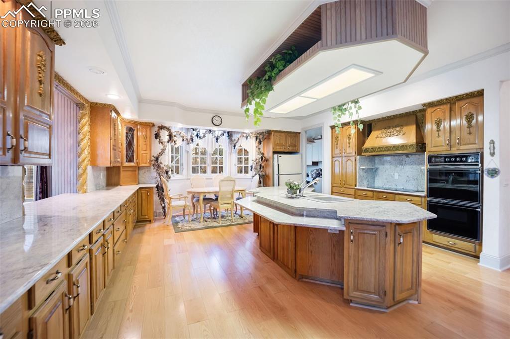15 Mirada Road Colorado Springs, CO 80906 - Photo 10 of 50 Kitchen with Island and eat in breakfast bar