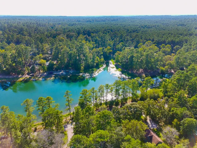 a view of a lake with mountains in the back