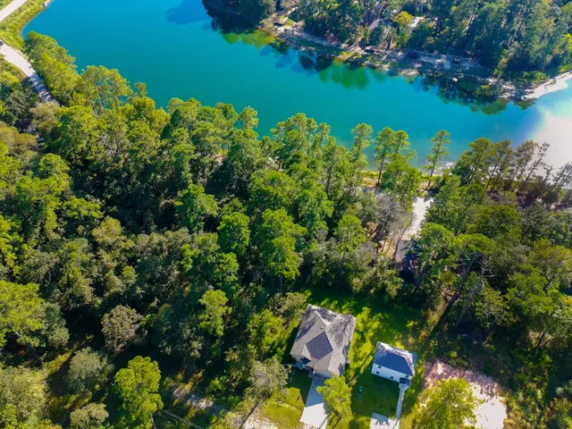 view of a lake with houses