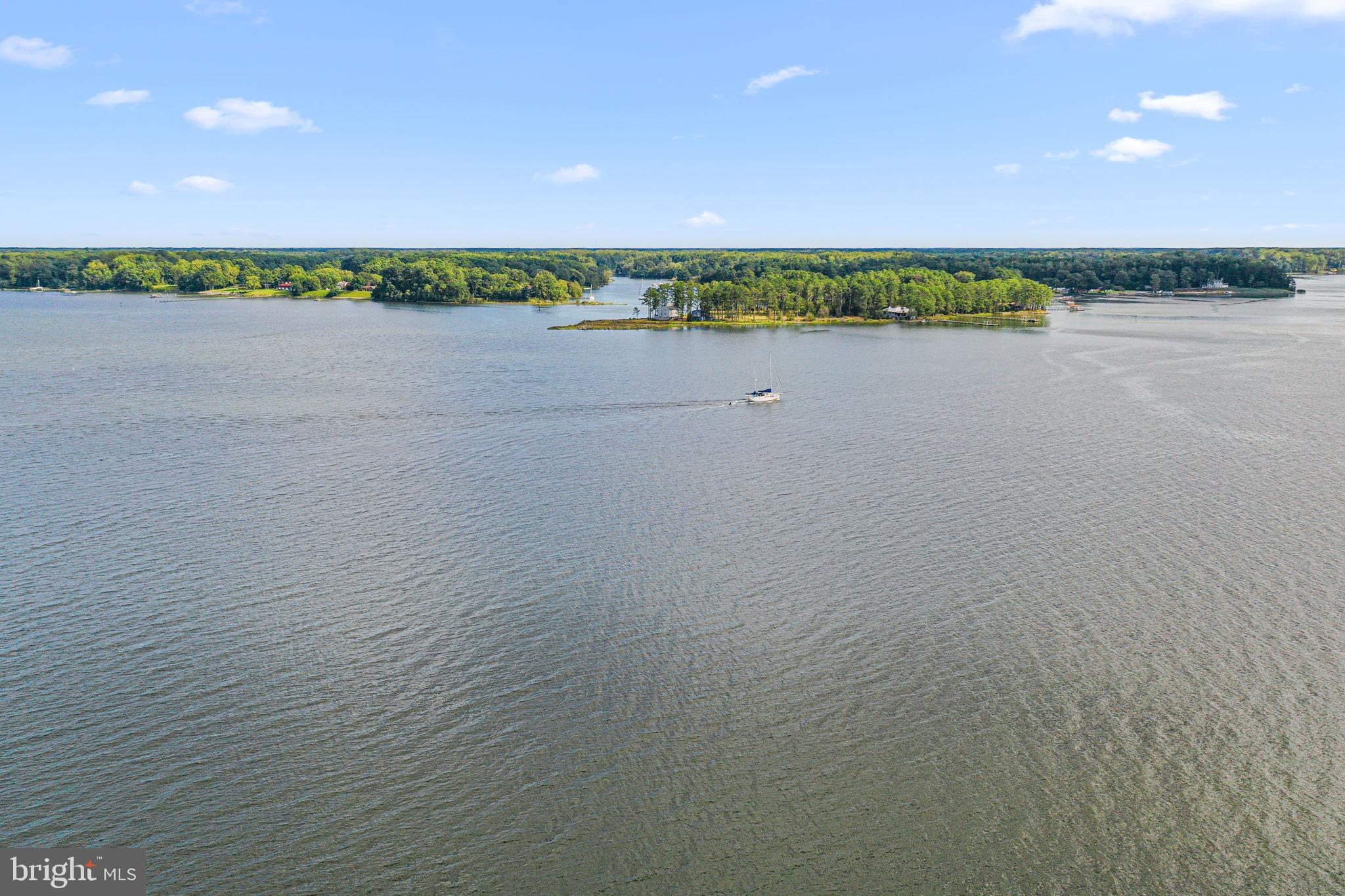 975 Wilton Creek Road Hartfield, VA 23071 - Photo 31 of 33 a view of an ocean and beach