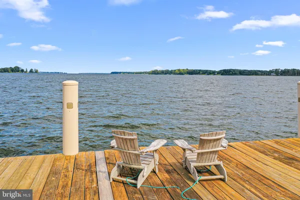 a view of a terrace with chairs