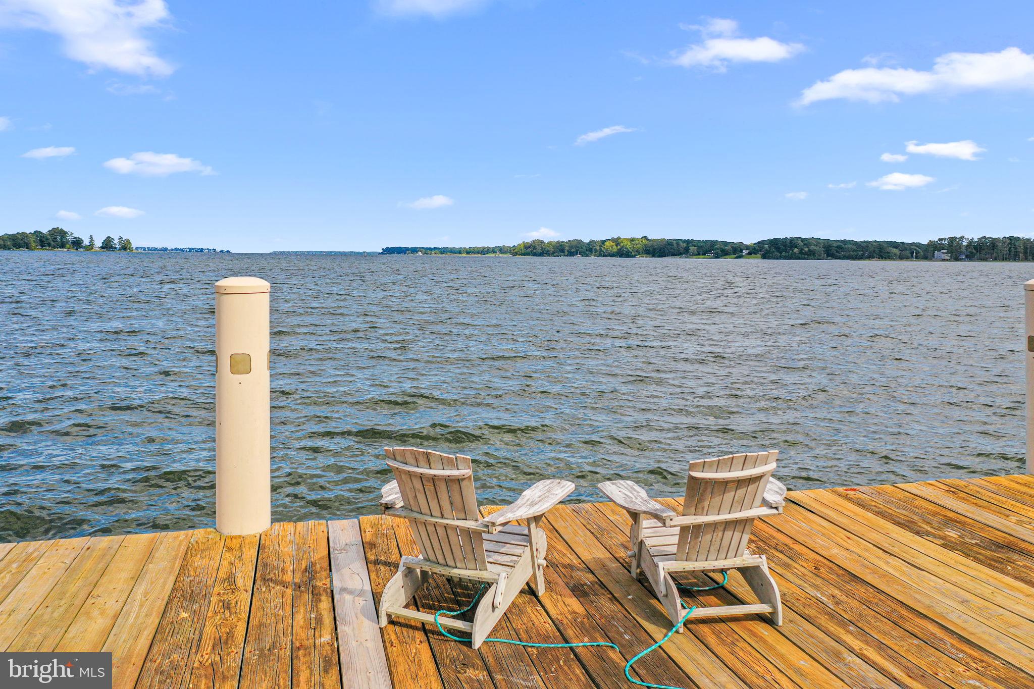 975 Wilton Creek Road Hartfield, VA 23071 - Photo 33 of 33 a view of a terrace with chairs