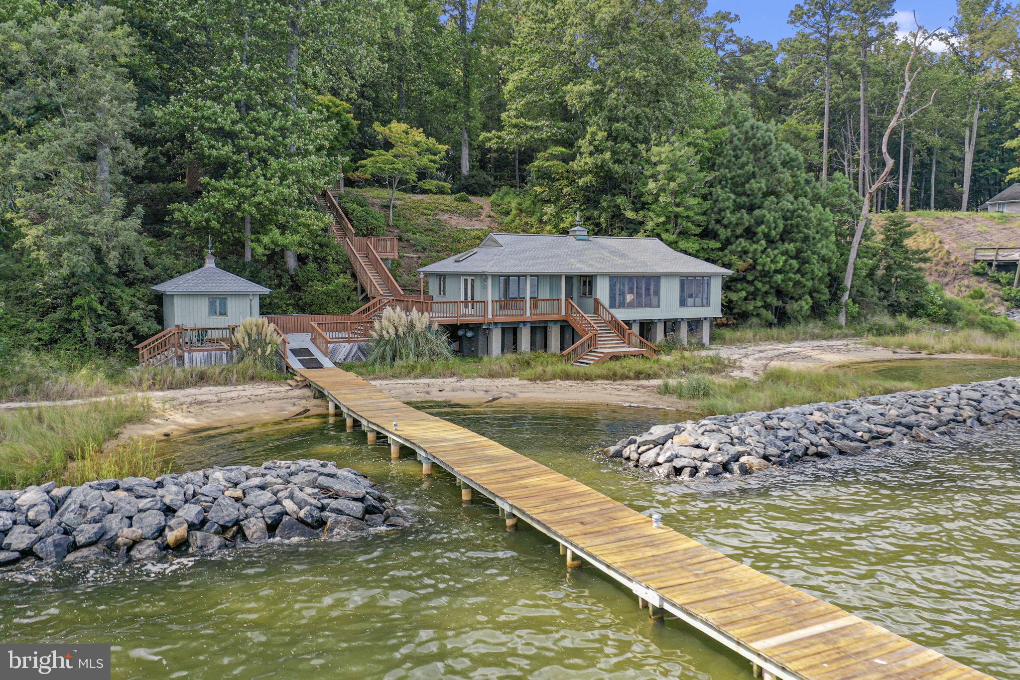 975 Wilton Creek Road Hartfield, VA 23071 - Photo 8 of 33 a view of house with a ocean view