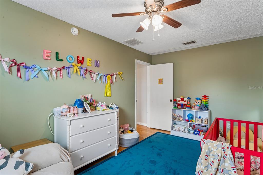 3112 Polk Avenue Spring Hill, FL 34609 - Photo 30 of 50 a kids room with toys and toys