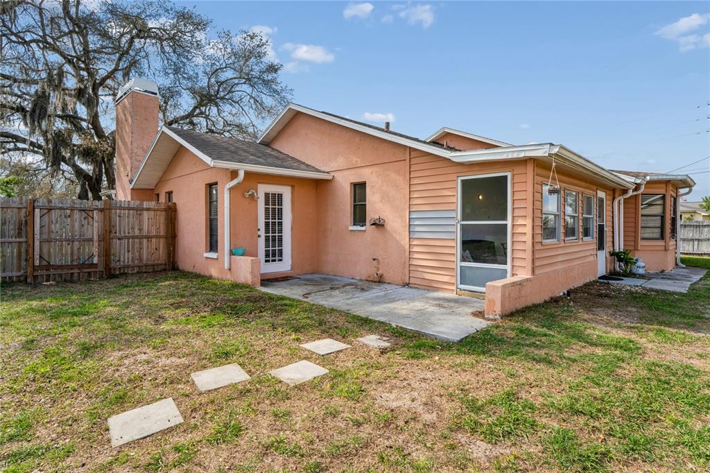 3112 Polk Avenue Spring Hill, FL 34609 - Photo 33 of 50 a view of a house with a yard