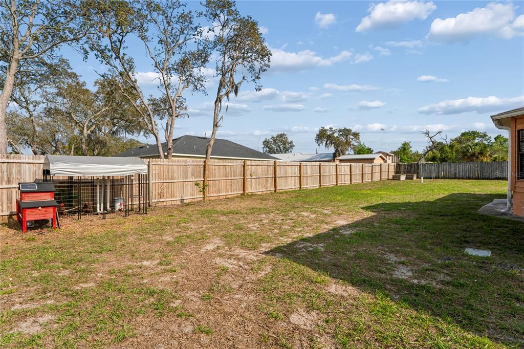 3112 Polk Avenue Spring Hill, FL 34609 - Photo 35 of 50 a view of a yard with an outdoor space