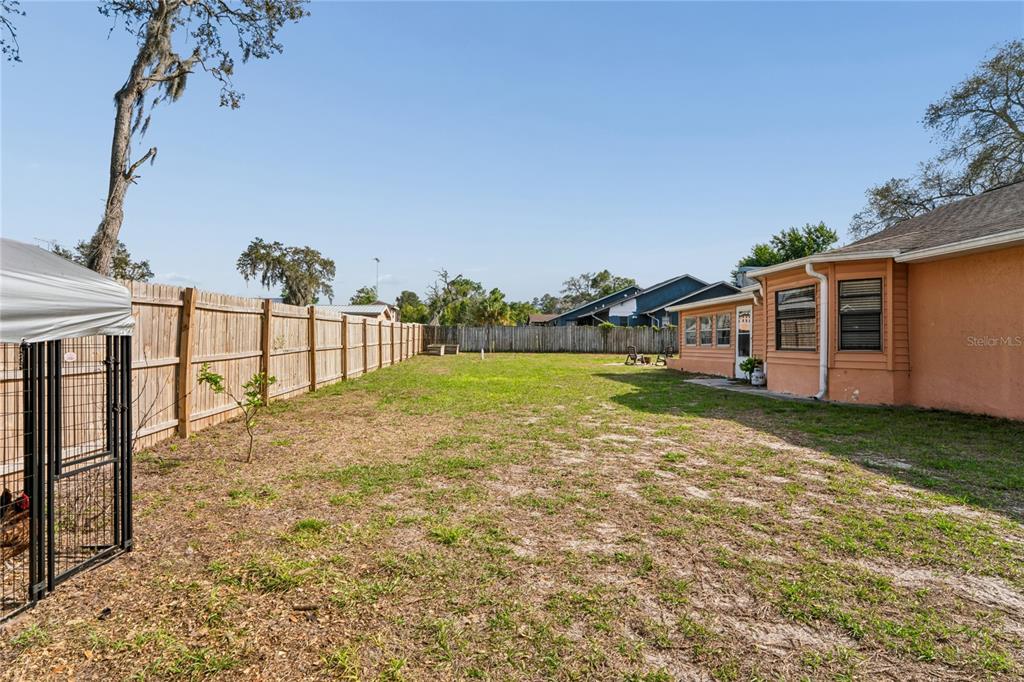 3112 Polk Avenue Spring Hill, FL 34609 - Photo 38 of 50 a view of a house with backyard and porch