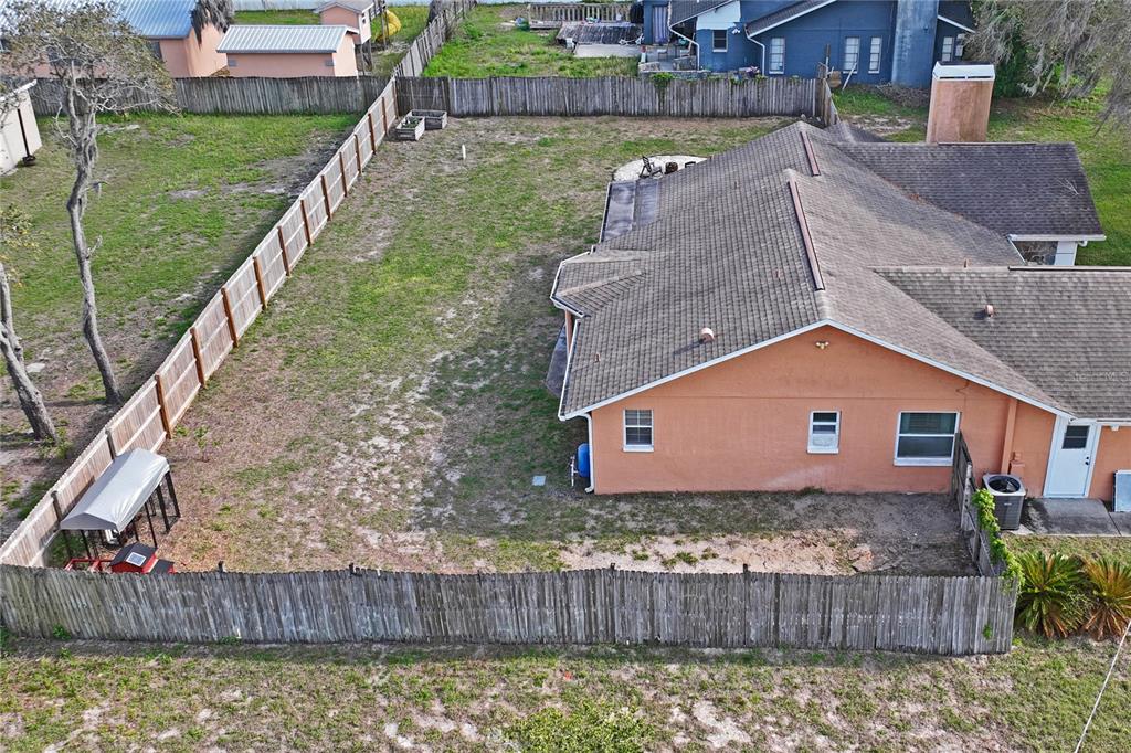 3112 Polk Avenue Spring Hill, FL 34609 - Photo 45 of 50 a front view of a house with a yard