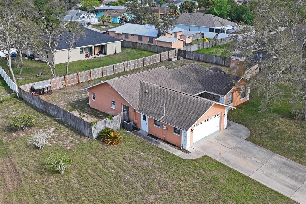3112 Polk Avenue Spring Hill, FL 34609 - Photo 48 of 50 an aerial view of a house with a big yard