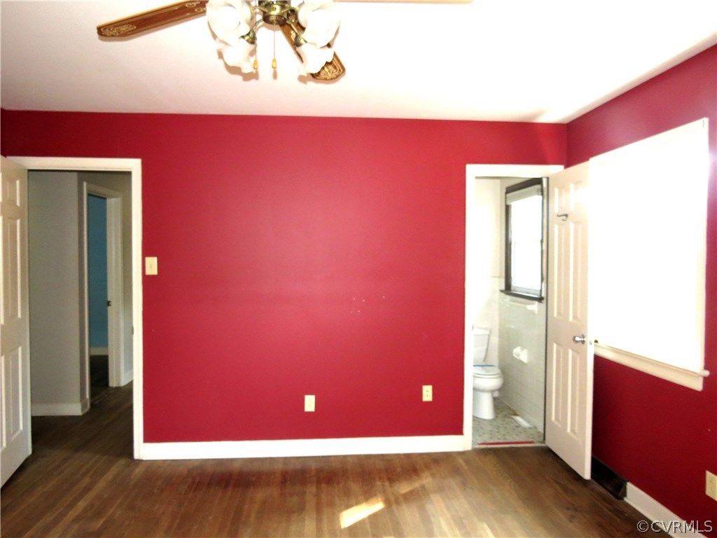 10810 Surry Road Chester, VA 23831 - Photo 15 of 24 a view of a livingroom with wooden floor