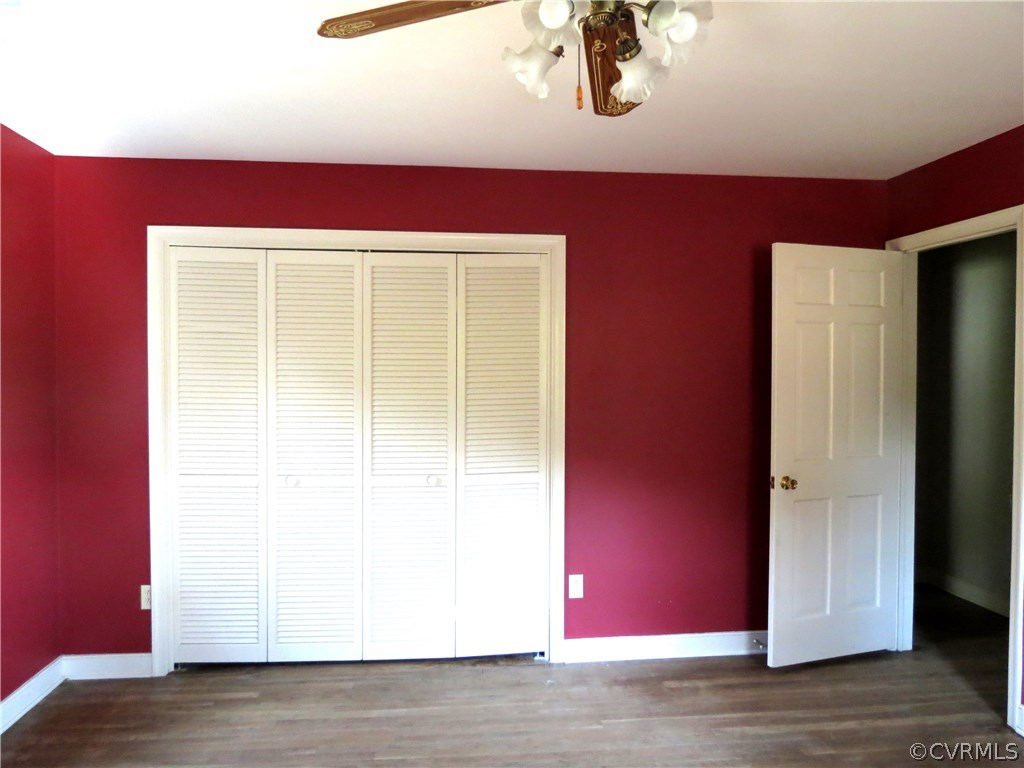 10810 Surry Road Chester, VA 23831 - Photo 16 of 24 a view of empty room with wooden floor