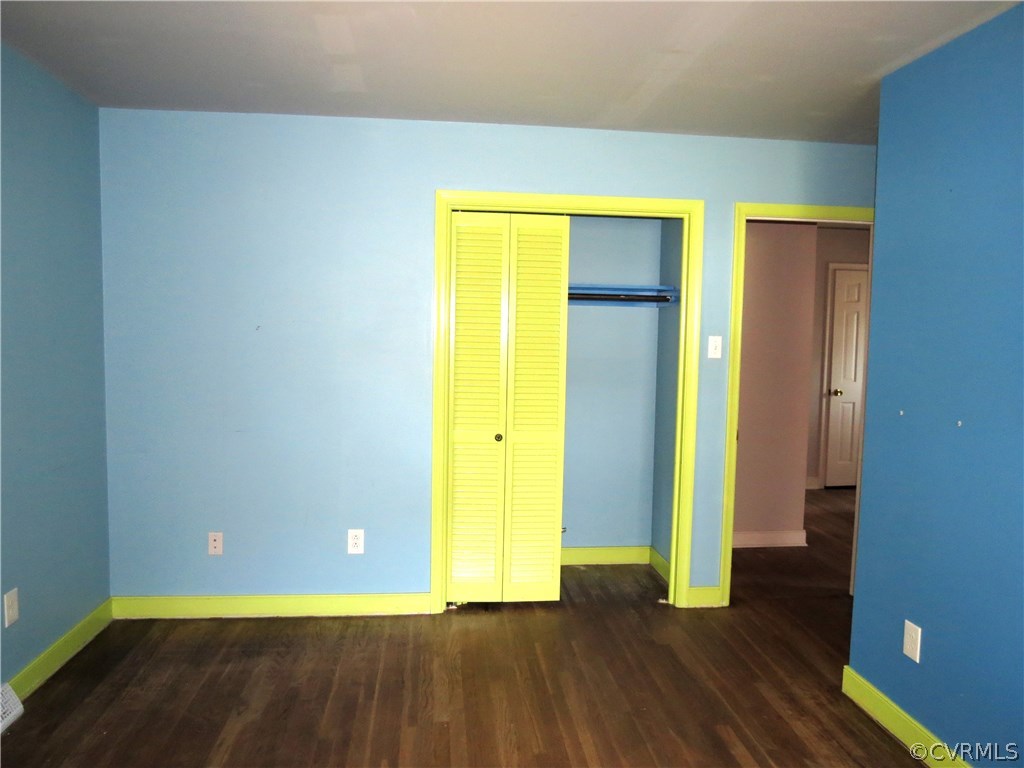10810 Surry Road Chester, VA 23831 - Photo 17 of 24 a view of empty room with wooden floor