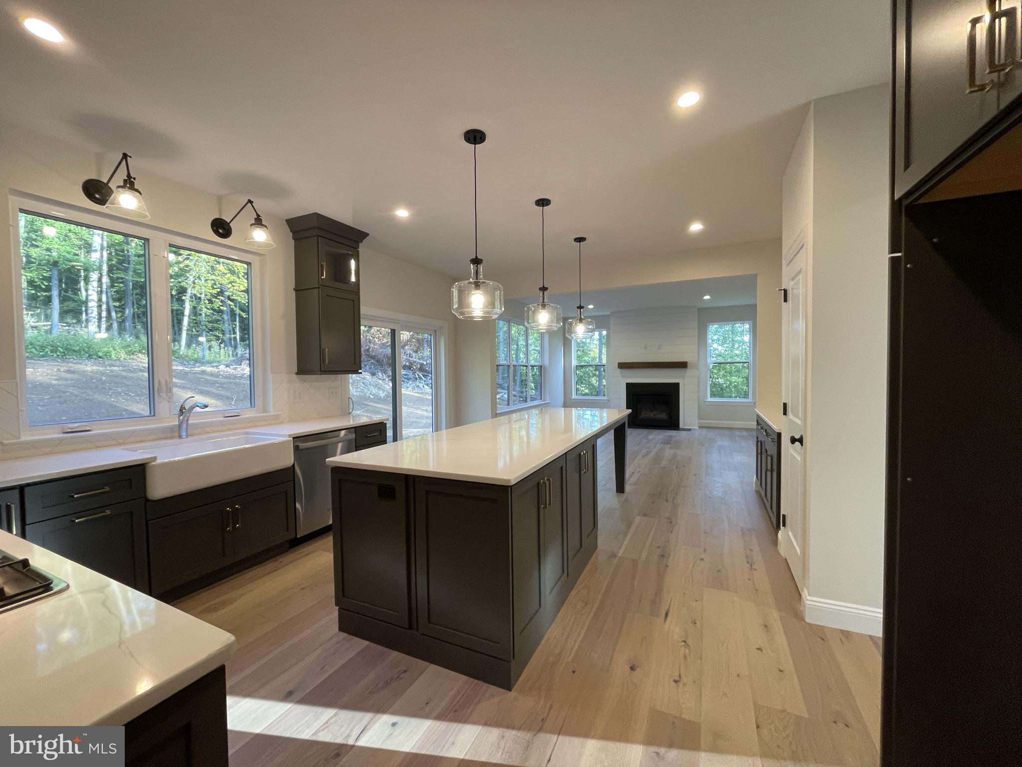 723 A Saylors Mill Road Spring City, PA 19475 - Photo 17 of 25 a large kitchen with kitchen island a sink stainless steel appliances and a counter top