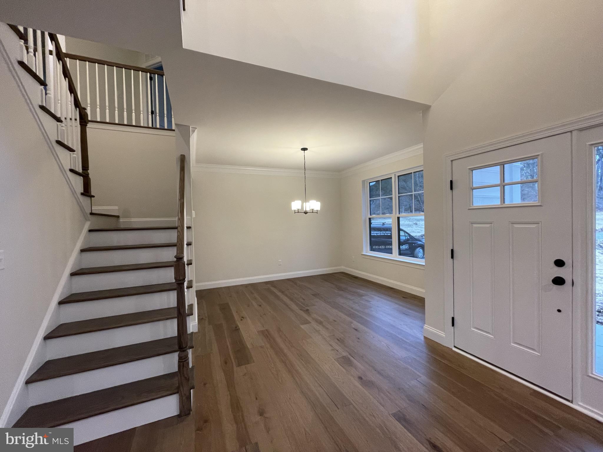 723 A Saylors Mill Road Spring City, PA 19475 - Photo 2 of 25 a view of a livingroom with wooden floor and stairs
