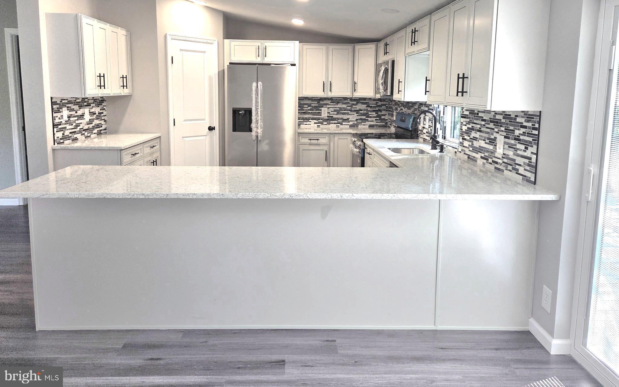4208 Ridge Crest Road Hurlock, MD 21643 - Photo 11 of 29 Granite counters, tile bkspash,soft close cabinets