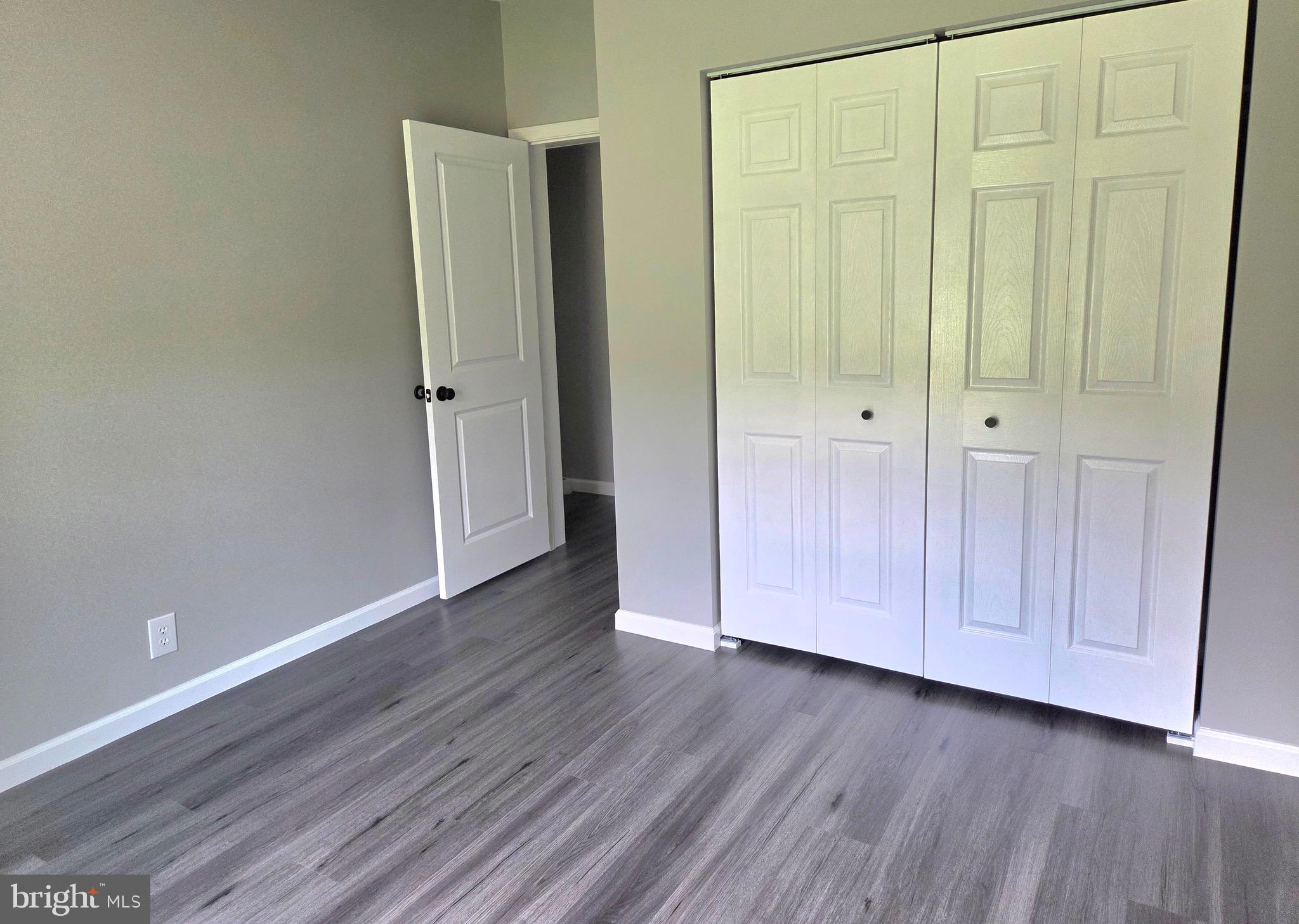 4208 Ridge Crest Road Hurlock, MD 21643 - Photo 21 of 29 2nd bedroom to 3rd bedroom