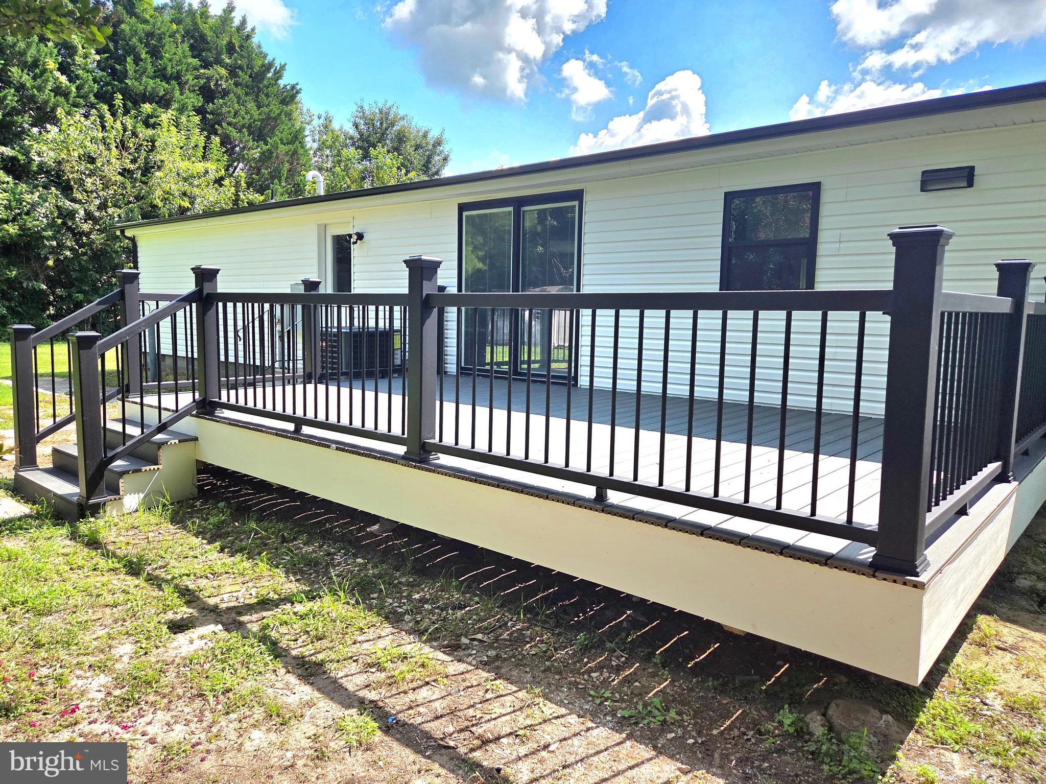 4208 Ridge Crest Road Hurlock, MD 21643 - Photo 6 of 29 Spacious maintenance free deck