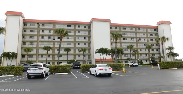 a car parked in front of a building