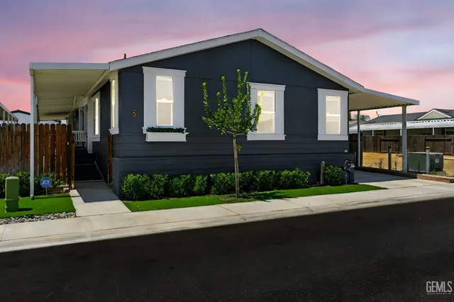 a view of balcony with wooden floor and stairs