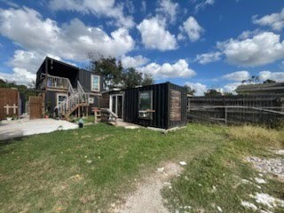 609 Firnat Street Houston, TX 77022 - Photo 10 of 10 a view of a garden with a bench in the patio