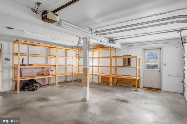 an empty room with a large window